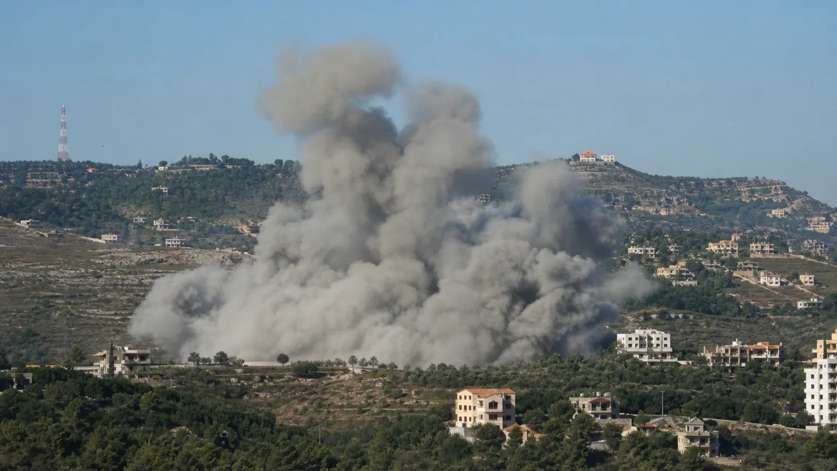 Israel strikes Lebanon ceasefire Nabatieh June 20 2026 rescue workers at destroyed residential building